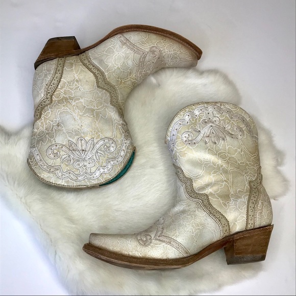 white embroidered cowboy boots